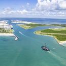 “A Shortfall of Gravitas” w/ landed F9 booster entering Port Canavera